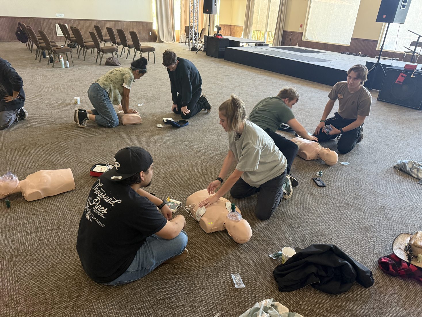 Instructor working with learners during a CPR class